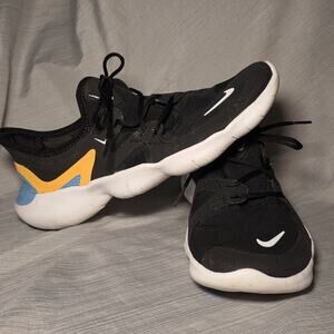Nike Free Women’s Running Shoes Size 6 Black Yellow Blue Athletic Sneaker